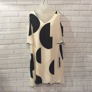 EST. 1946 cream and black dot dress